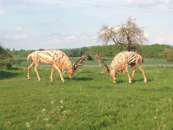 Tudor Caravan Park - Wooden Stags by Ralf Cully
